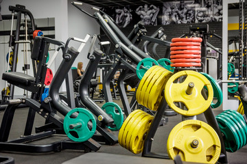 Fototapeta premium empty gym for fitness and bodybuilding with fitness equipment and dumbbells.