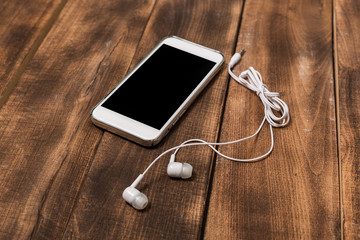 white phone on wood blank space