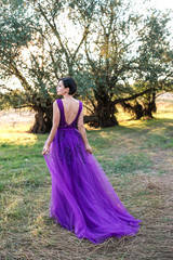 Fototapeta premium Portrait of beautiful girl in the parkland.