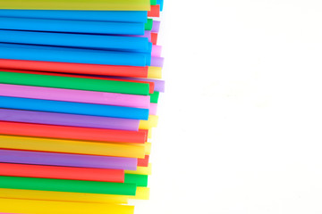 Abstract colorful background. Background from cocktail tubes close up. Soft focus.