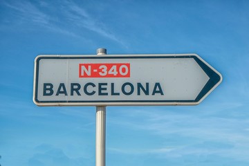 Road sign directive way to Barcelona city