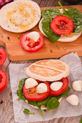 Tigella bread with spinach and tomatoes. 