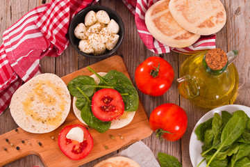 Tigella bread with spinach and tomatoes. 