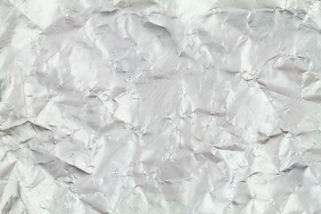 Wrinkled silver foil texture abstract background
