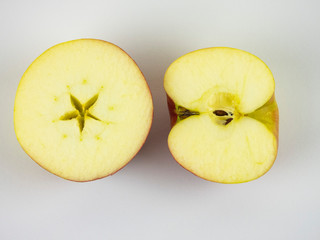 apple cut up and down, on a white background