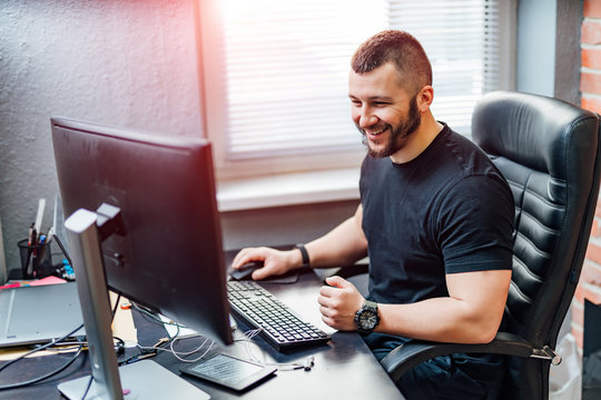 Programmer working in a software development company office