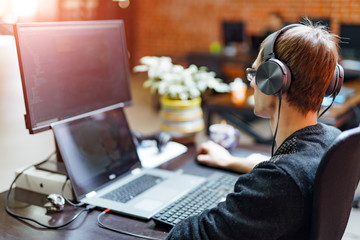 Developing programming and coding technologies. Website design. Programmer working in a software...
