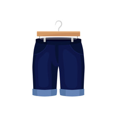 denim shorts on clothes hanger. Fashion concept.