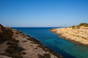 View of Cala Greca in the summer season