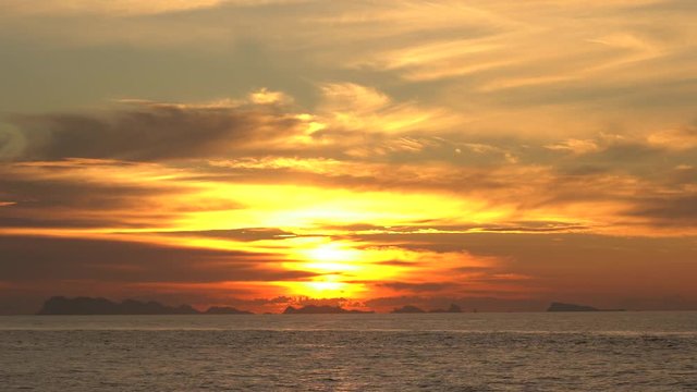 Beautiful sunset over sea water wave. Summer vacation concept. Island Koh Phangan, Thailand, establishing shot