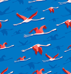 Blue sky and flying flamingos. Seamless pattern. The composition can be used for environmental backgrounds, thematic sites, textiles.