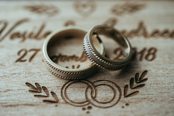 Wedding rings on wooden box , Very shallow focus