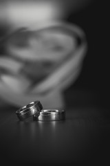 Wedding rings on dark table , closeup
