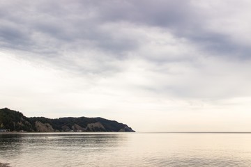 On the beach with cloudy weather