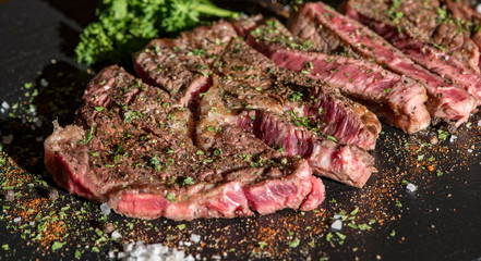 Grilled flat iron steak shot in flat lay style