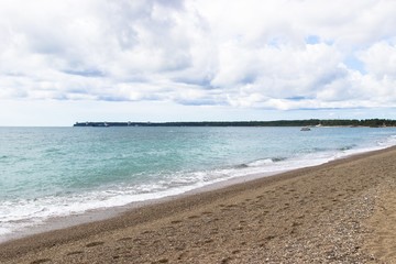 On the beach with cloudy weather
