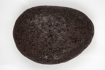 Fototapeta premium a stone with many holes in its surface.