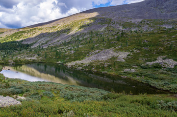 beautiful summer landscape in the Altai mountains overlooking the lake