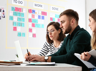Young business people at meeting in office