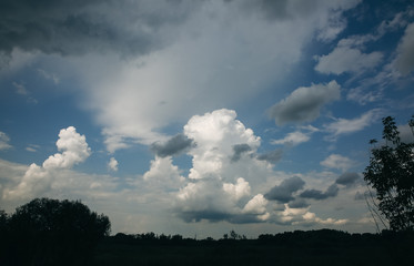 Obraz premium Blue sky with white clouds. Beautiful nature wallpapers background. Sutumn season nature.