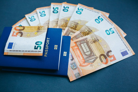 Foreign passport and money. Travel concept photo. Holidays and new countries. Euros banknotes.
