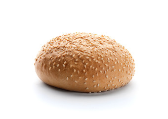 Tasty burger bun on white background