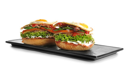 Tasty burgers on white background