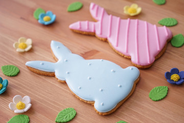 Tasty Easter cookies on wooden table
