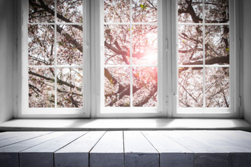 Desk of free space and spring window background 