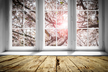 Desk of free space and spring window background 