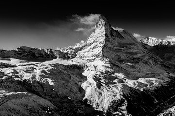 matterhorn mountain covered by clouds