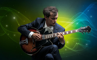Serious classical guitarist with fabled sparkling wallpaper