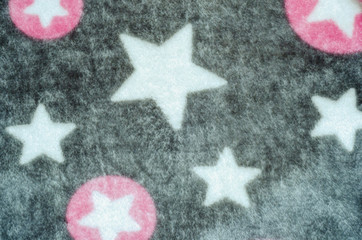 gray background with white stars and pink circles