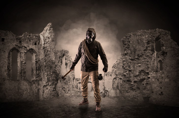 Hazard, menace man in a ruined crumbly building with arms on his hand
