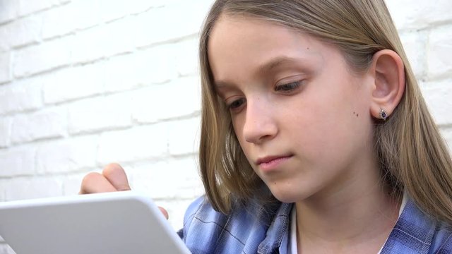 Child Studying on Tablet, Girl Writing in School Class, Learning Doing Homework