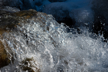 Texture of boiling water, waterfall, mountain river,