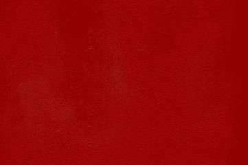 Ungleichmäßige leicht glänzende Oberfläche rot