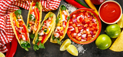 Fototapeta na wymiar Tasty appetizing tacos with vegetables