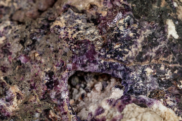 macro stone Fluorite mineral on a black background