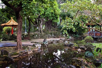 Fototapeta na wymiar Traditional chinese garden with two pavilions in Taipei, Taiwan