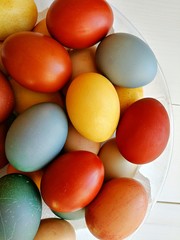 Natural dyed eggs with items from pantry. Easter holiday.