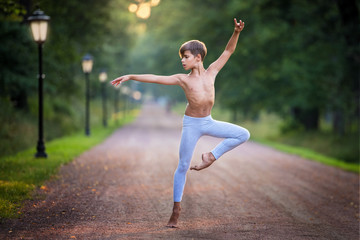 boy dancing in the park