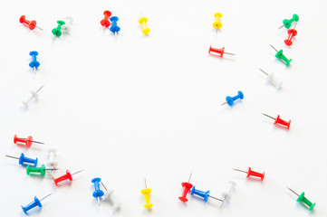 Stationery on white background. Multi-colored buttons of paper.