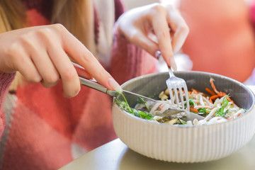 Healthy food fresh vegetable salad. beautiful woman eating healthy ingredient for good health. healthcare concepts.