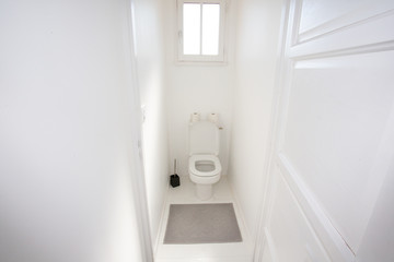 Toilet in shades of white modern ceramic clean interior home