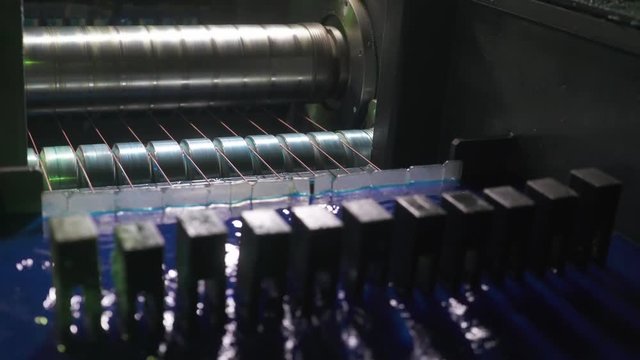 Metalworking and steel production, the process of winding and electroplating, brass wire on reels, rotating spools metal cord.