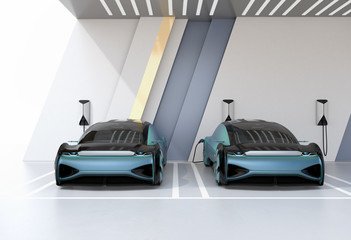 Two metallic blue autonomous electric cars charging in charging station. 3D rendering image.