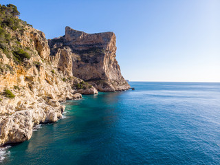 Fototapeta na wymiar Cliffs in Moraig cove beach in Benitatxell, Alicante, Spain