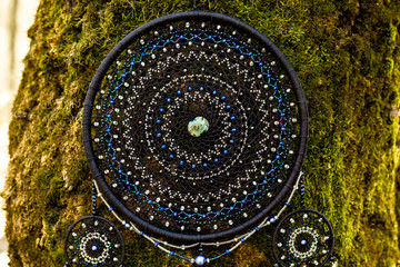 Handmade dream catcher with feathers threads and beads rope hanging