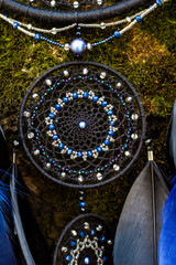 Handmade dream catcher with feathers threads and beads rope hanging